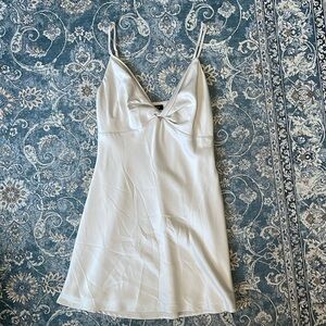 Satin mini dress with twist front